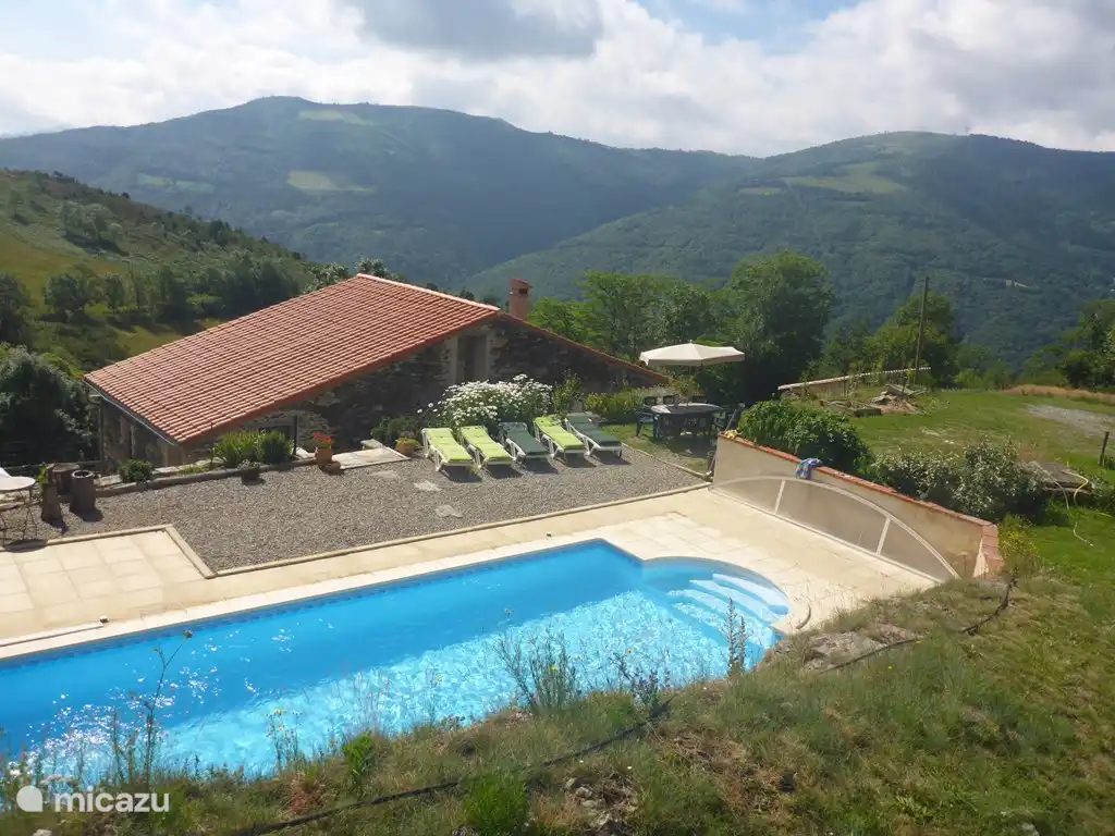 Swimming pool, behind the house with beautiful views.