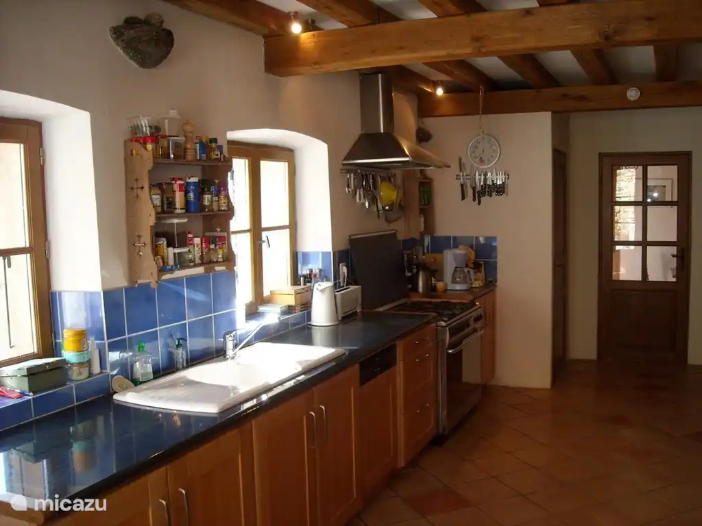 Fine large kitchen, with everything on and on.