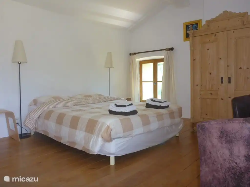 Spacious master bedroom with private bathroom.