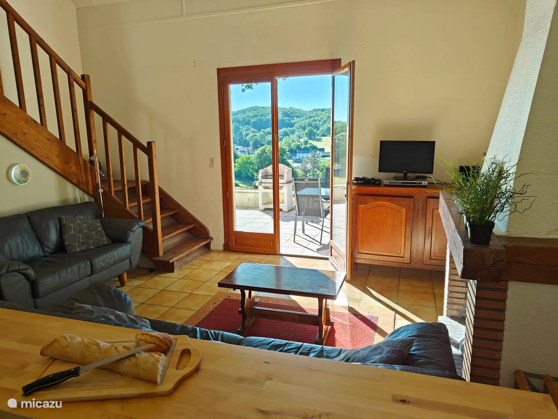 The living room with a beautiful view of Carlux, and sun in the morning.