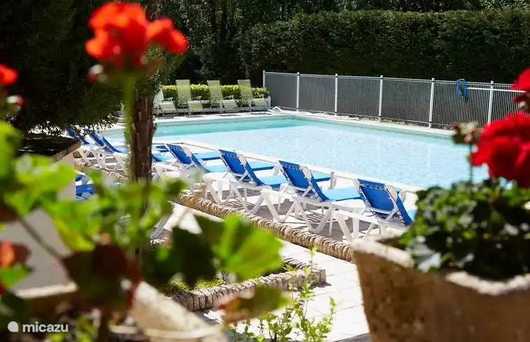 The large communal pool is heated throughout the holiday season.