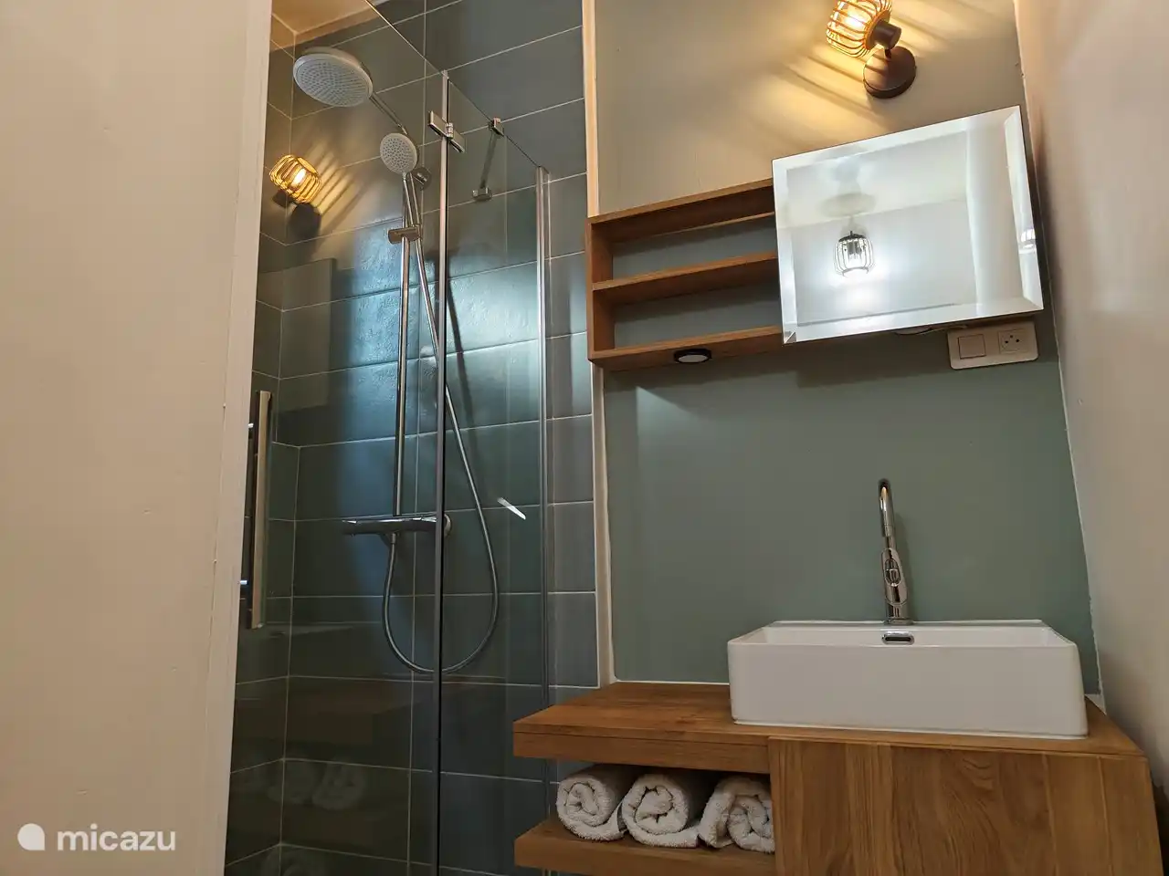 The recently renovated bathroom with shower is located on the ground floor.