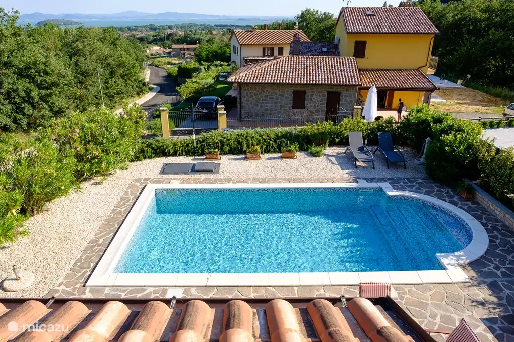 View of pool and lake.
