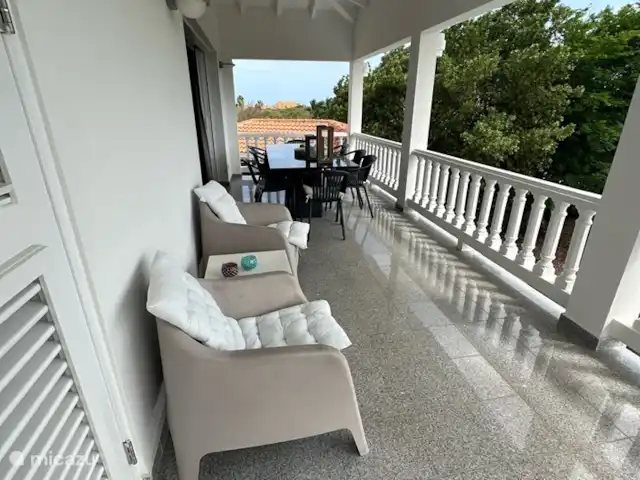 Kavel 15 coral estate rif st.marie huren in Curaçao, Banda Abou (west), Coral Estate, Rif St.Marie - villa Terras op de porch van de 1e etage met uitzicht over de Caribische Zee.