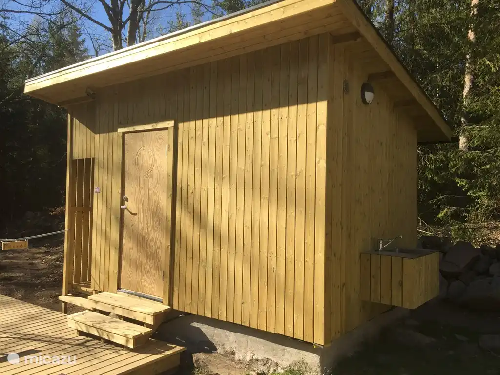 Ankleidezimmer mit WC, inklusive Sauna und Badewanne