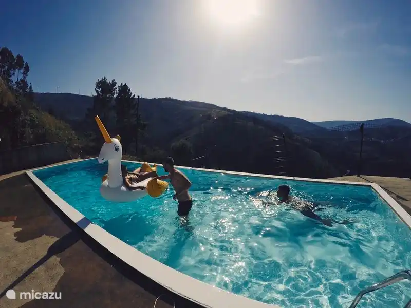 the swimming pool is a 2-minute walk from Casa Cancelinha