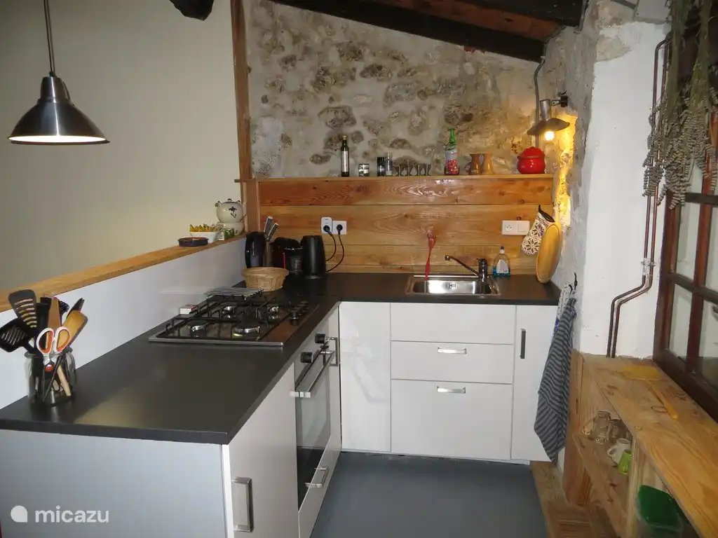 kitchen with oven and nespresso machine