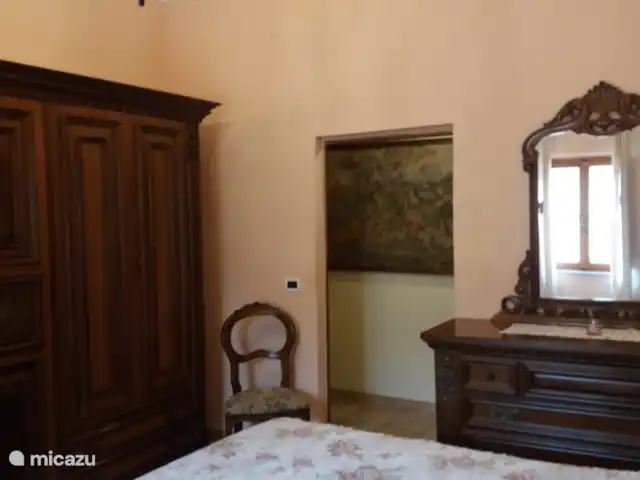 appartement huren in Italië, Toscane, Montaione – Magnolia Slaapkamer 1 met 2-persoonsbed