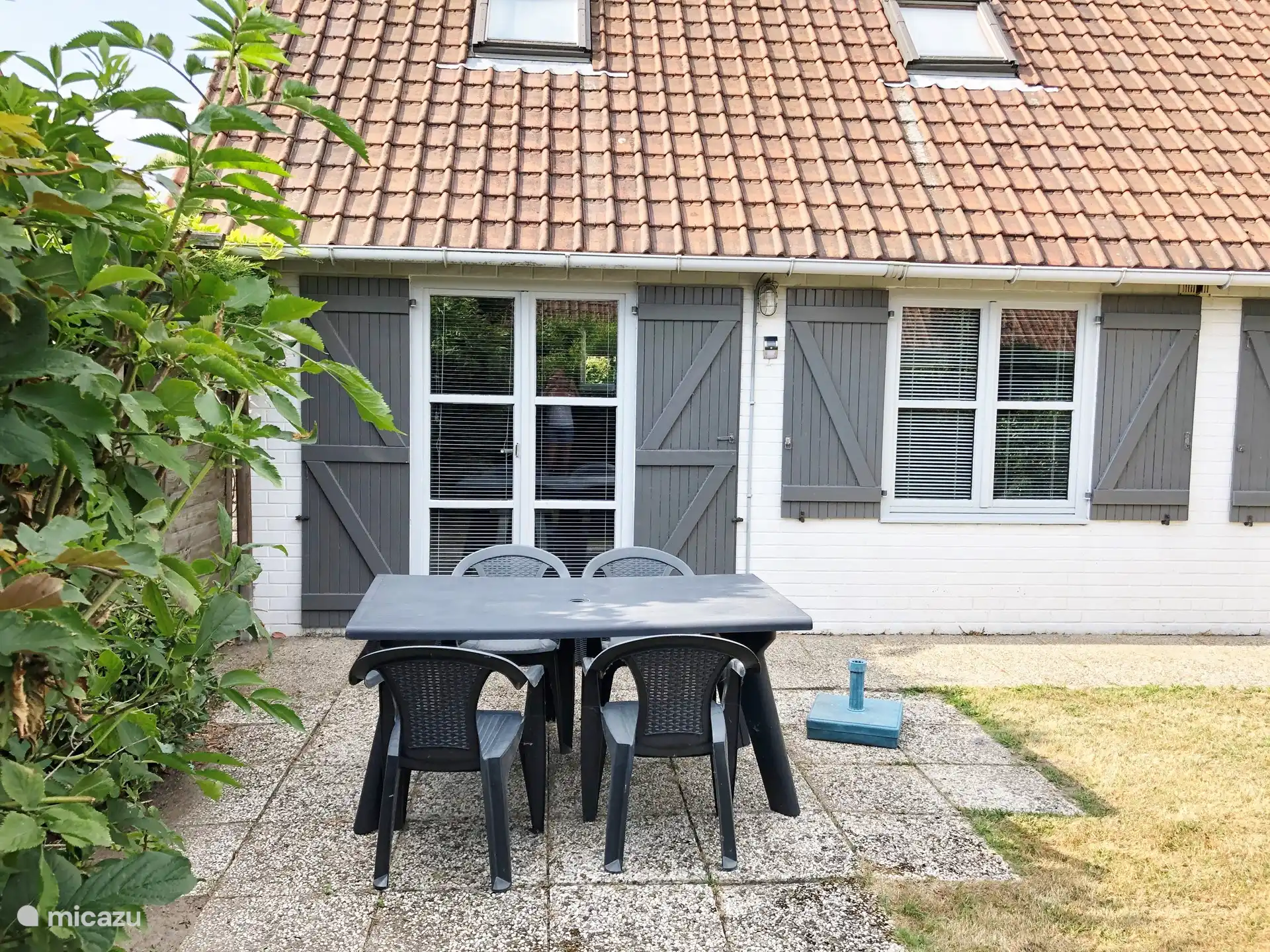 Terraza con muebles de jardín