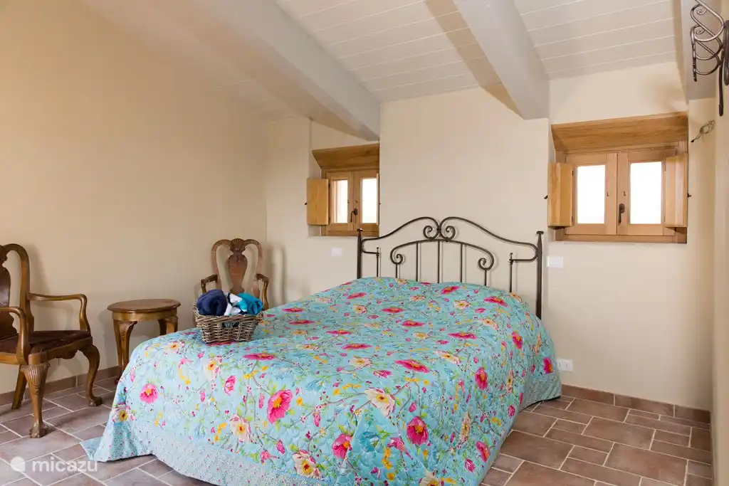 First bedroom of Lungo with private terrace, private shower and toilet