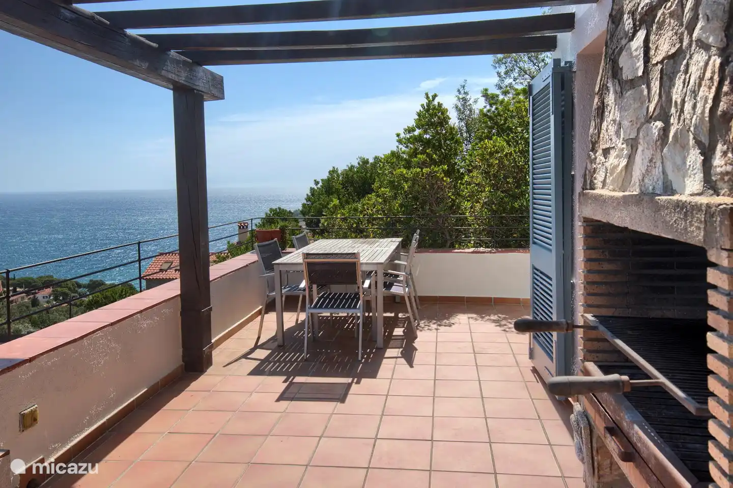 Boventerras met zeezicht