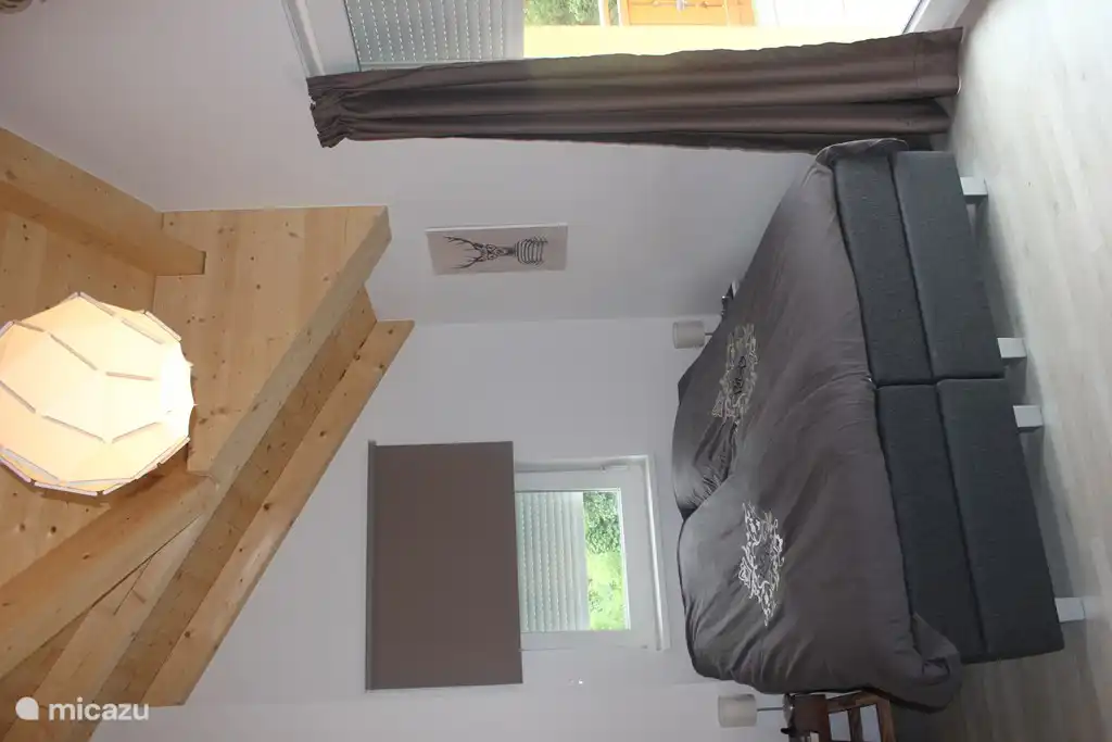 Chambre côté sud avec balcon et sauna