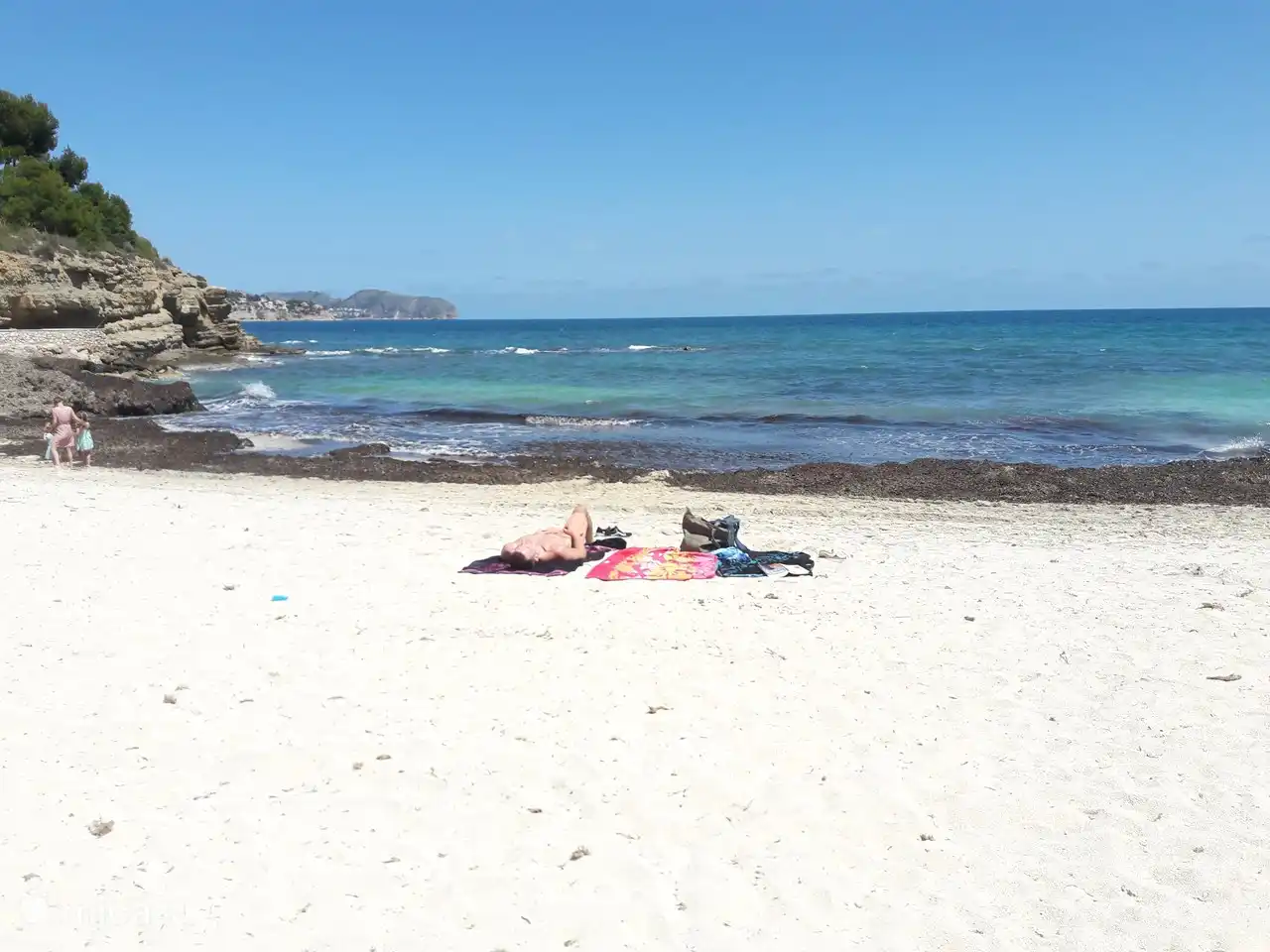 cala fustera at the bottom of the mountain 1 km