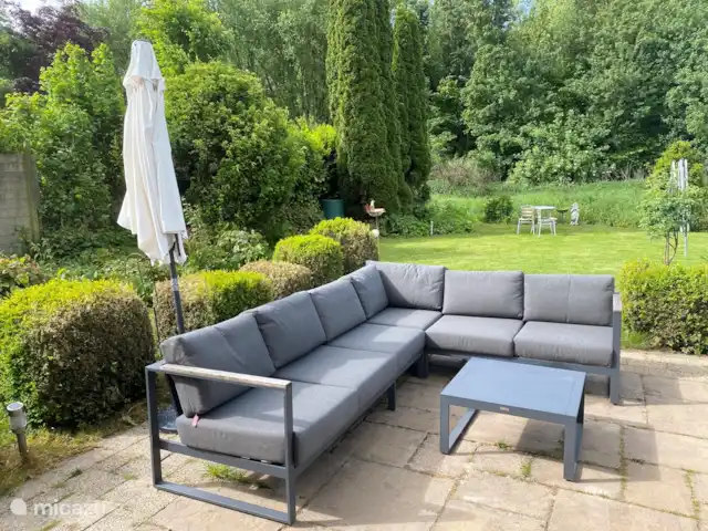 Location de Vacances Pays-Bas, Flevoland, Zeewolde, villa - The Dutch Green View Villa joli salon situé dans le jardin arrière