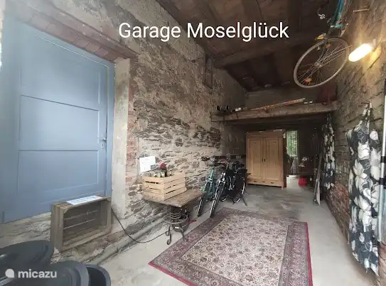 Garage adjustment place for bicycles and possibility to charge batteries