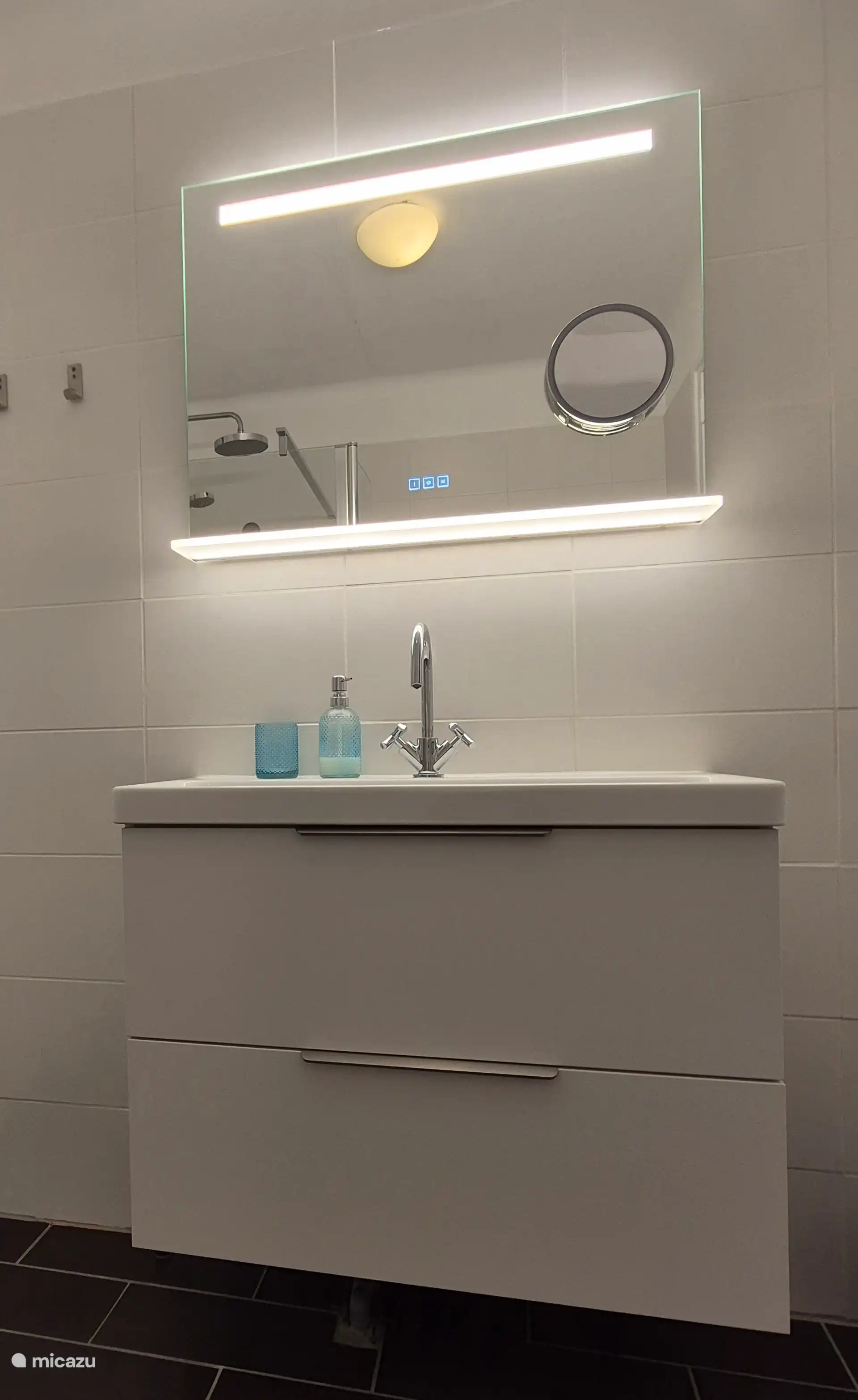 New bathroom cabinet and mirror.