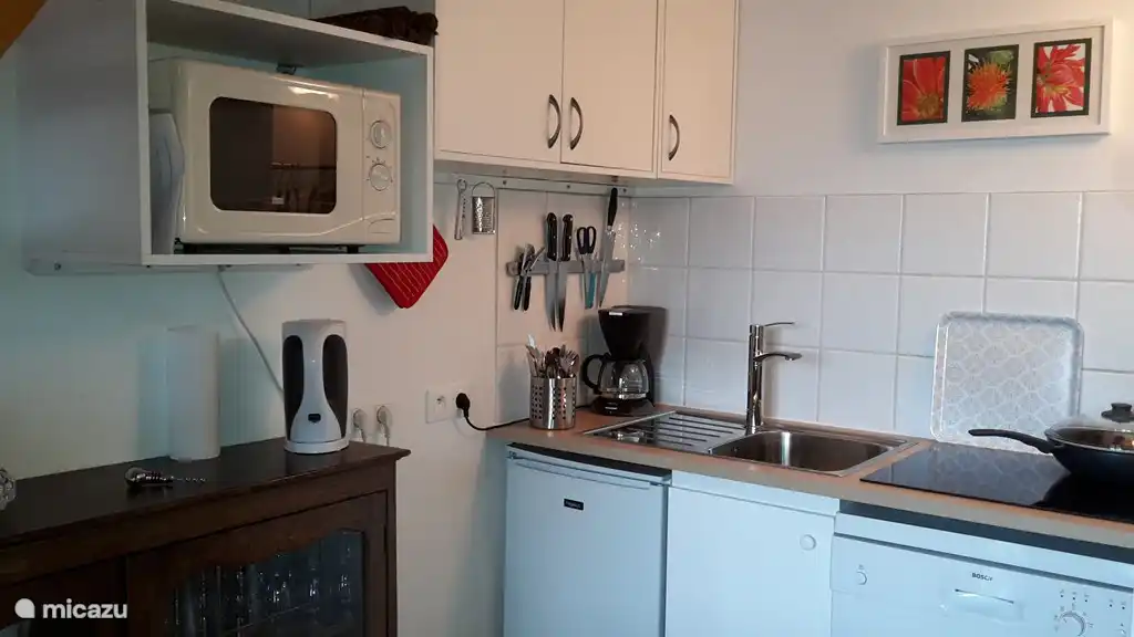 Coin cuisine dans l'appartement