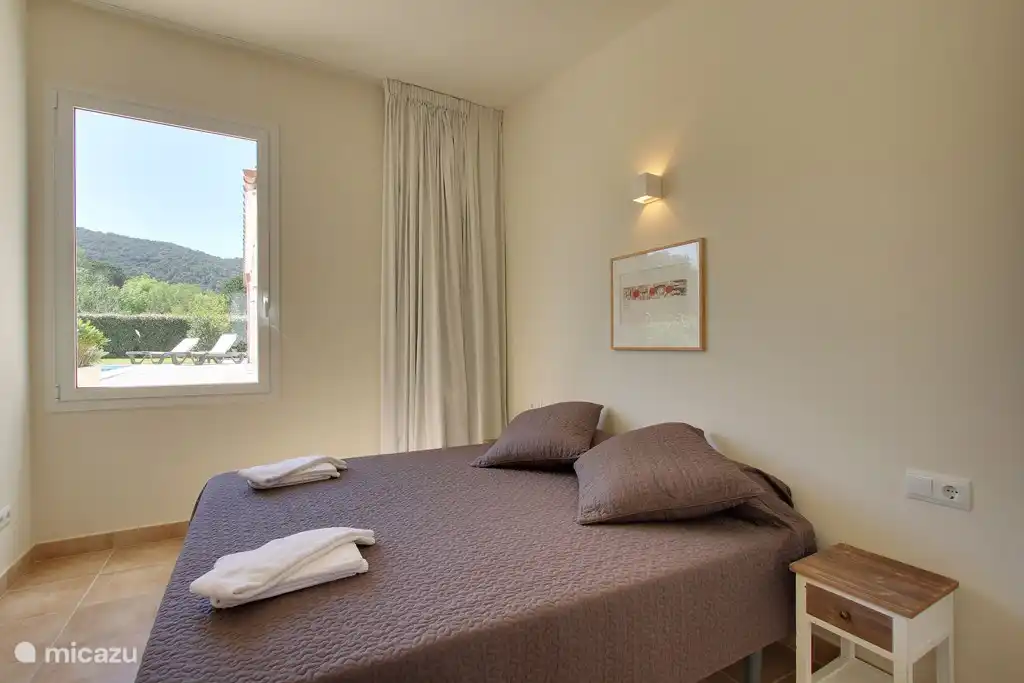 Bedroom in the small house with private bathroom