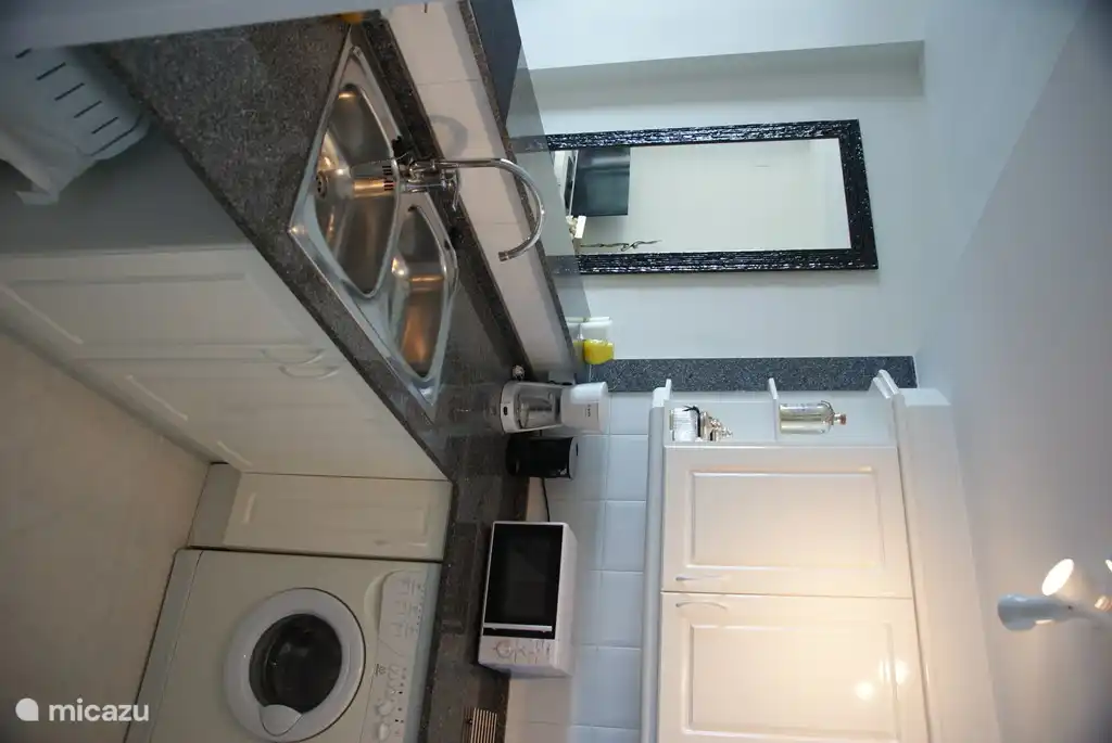 kitchen with dishwasher, electric fire, oven, microwave and dishwasher