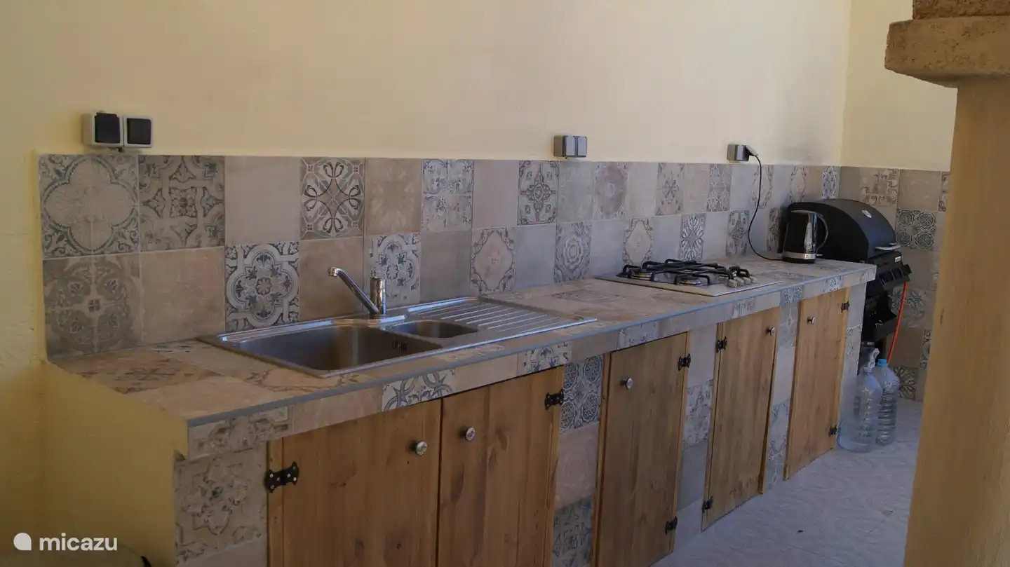 Outdoor kitchen with barbeque