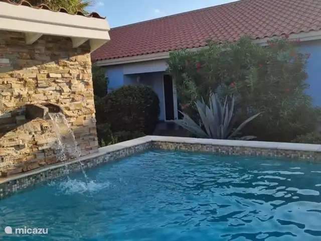 Bon repos | Curaçao, Curaçao-Centre, Blue Bay - maison de vacances Piscine avec cascade.