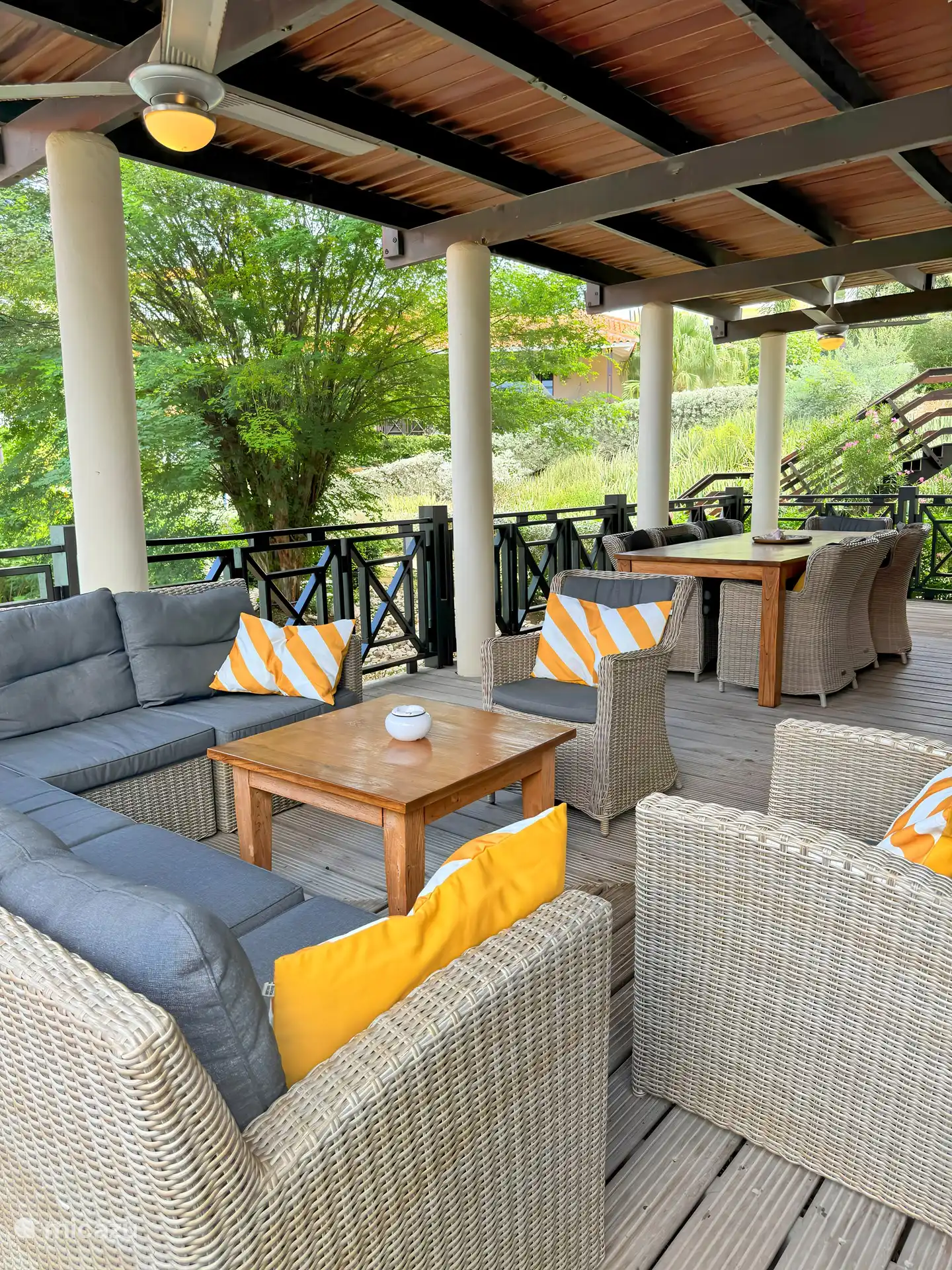 comfortable lounge set in tropical garden with lots of privacy