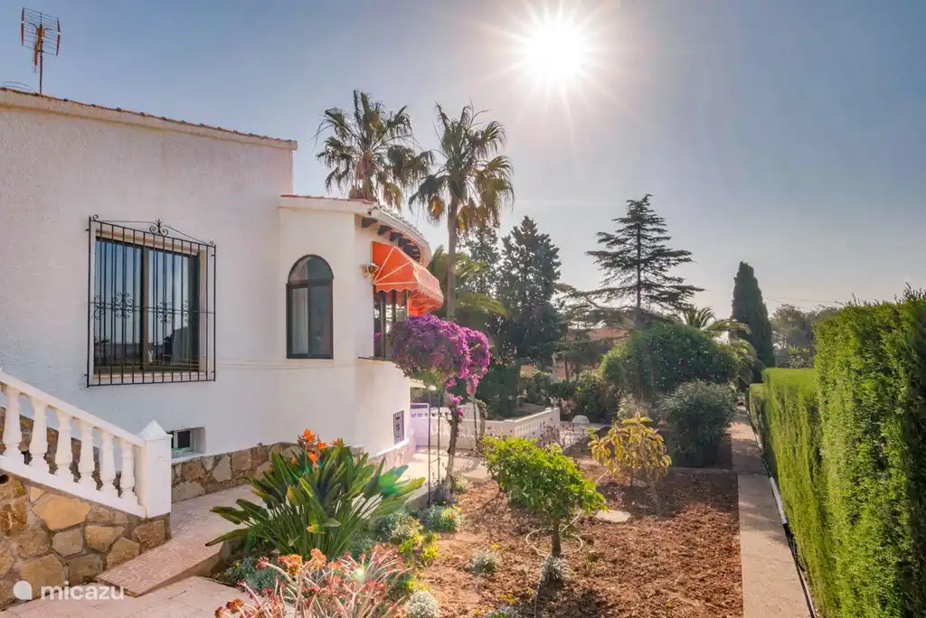 the beautifully landscaped Mediterranean garden