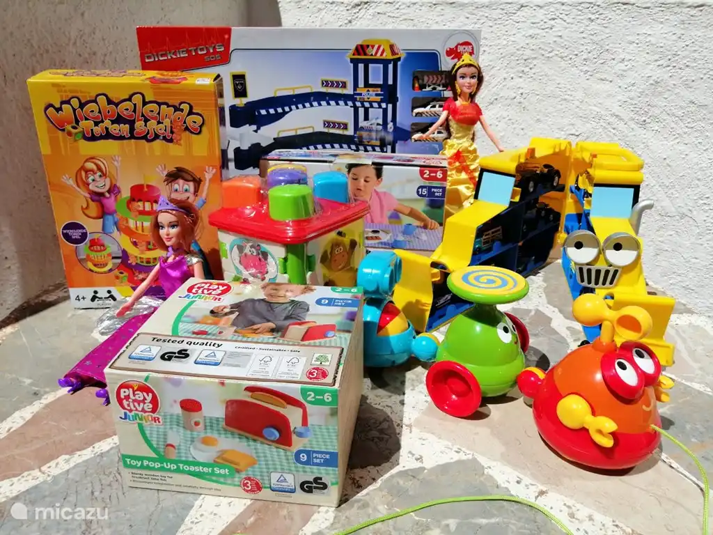 Toys for the toddlers: cars, barbies, box of blocks, wobble tower, 'train', etc.
