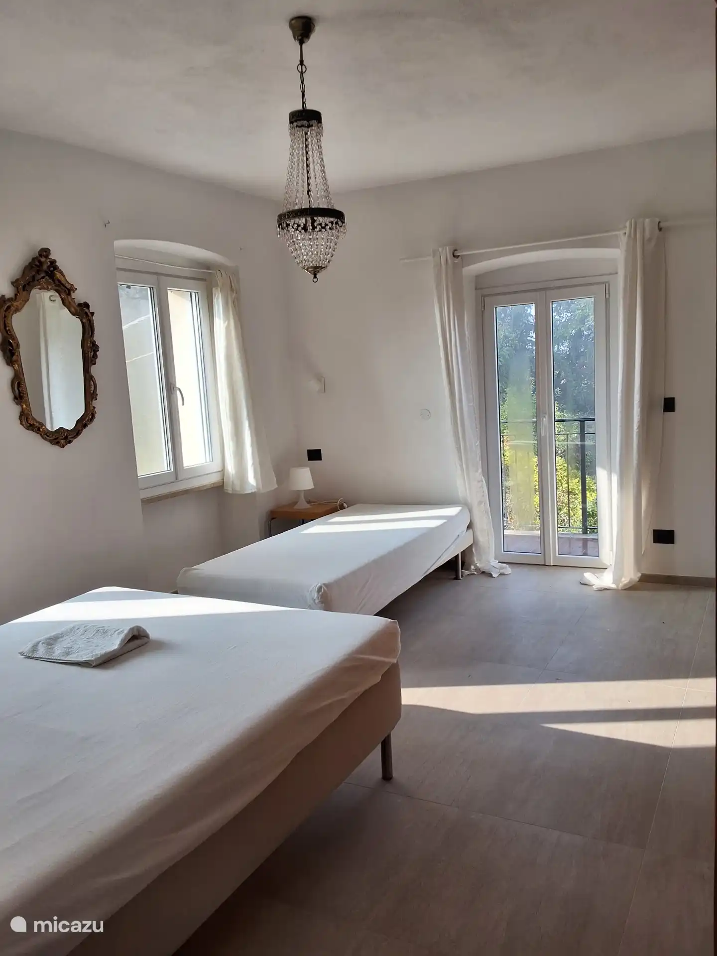 Chambre de 3 personnes avec balcon