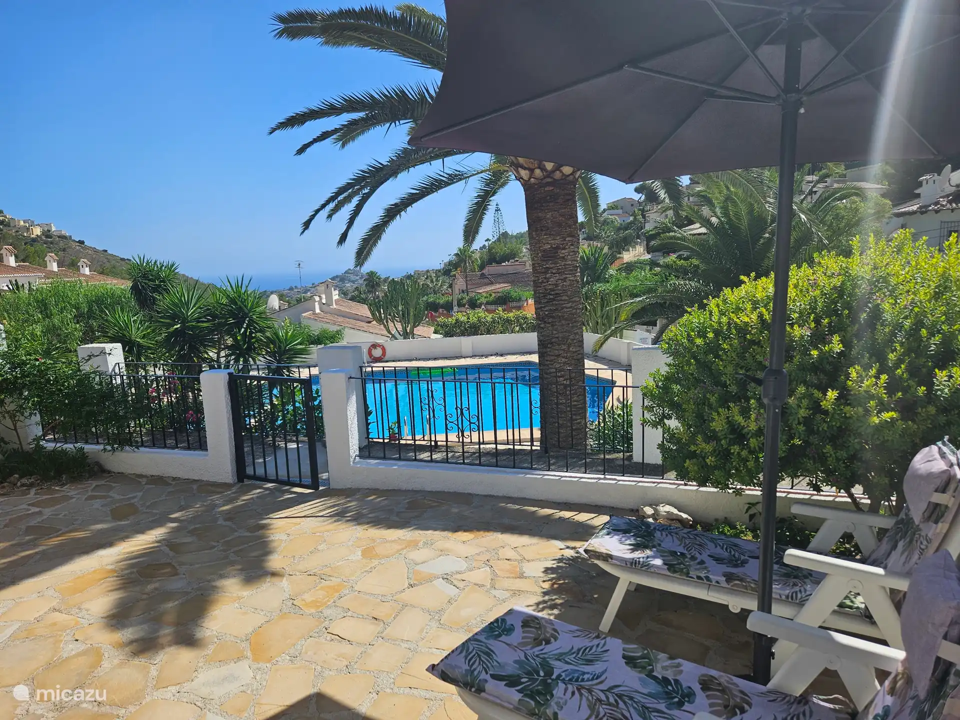 With fantastic views of the Mediterranean Sea and a view of the swimming pool.
