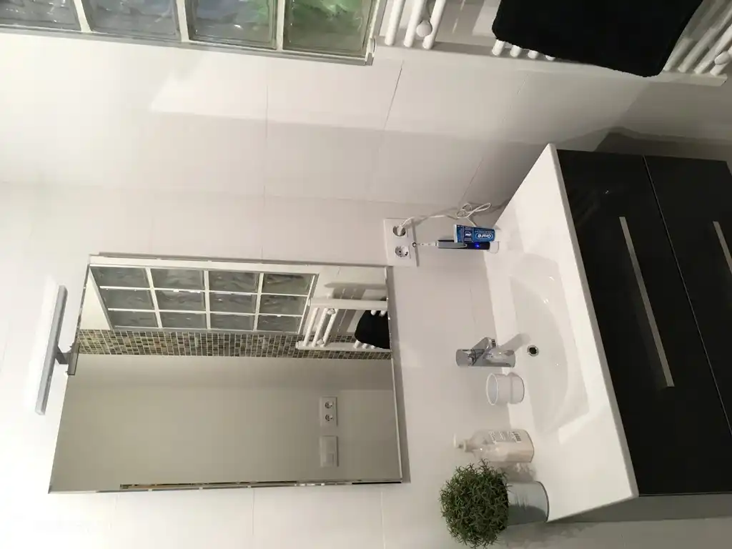 Sink, toilet and shower in each bathroom.