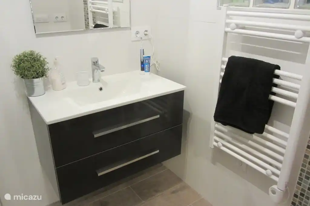 Spacious bathrooms with heating