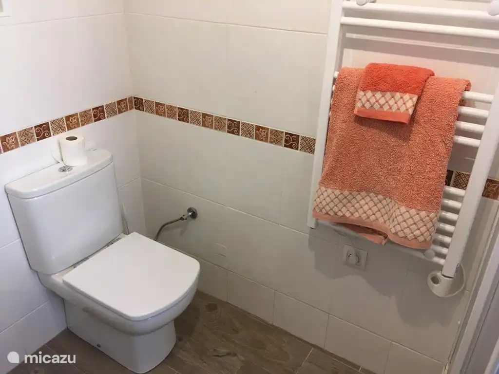 Bathrooms are both spacious and pleasant