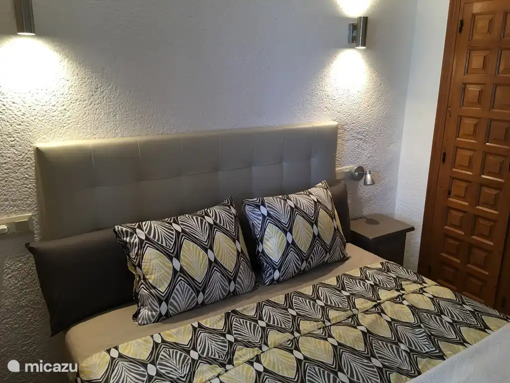 Bedrooms with beds of 2 meters length (1x double, 2x single). 

For stay during winter the bedrooms are both equipped with a plate radiator.