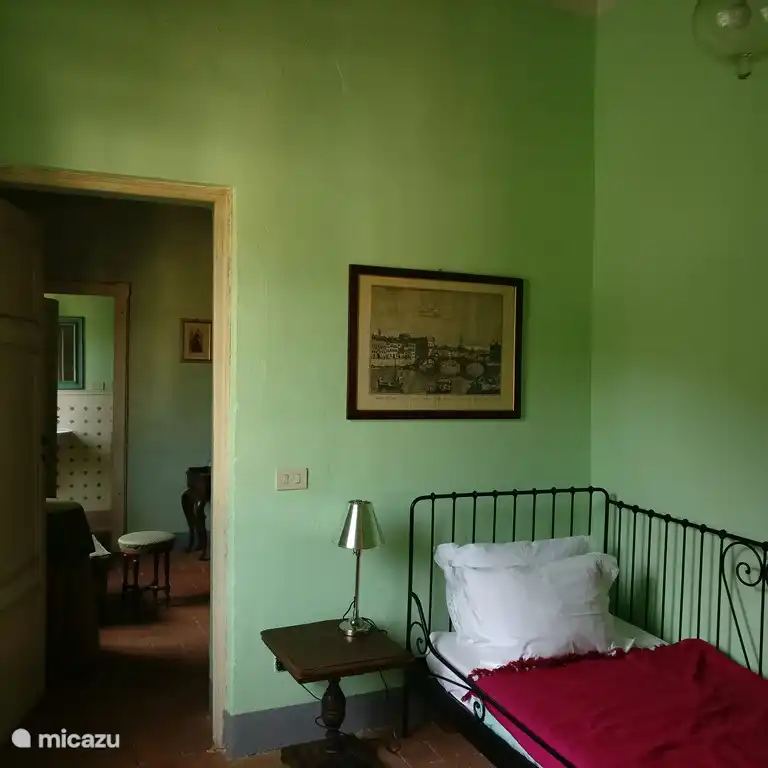 The single room has a door to the double room which which it can share the bathroom