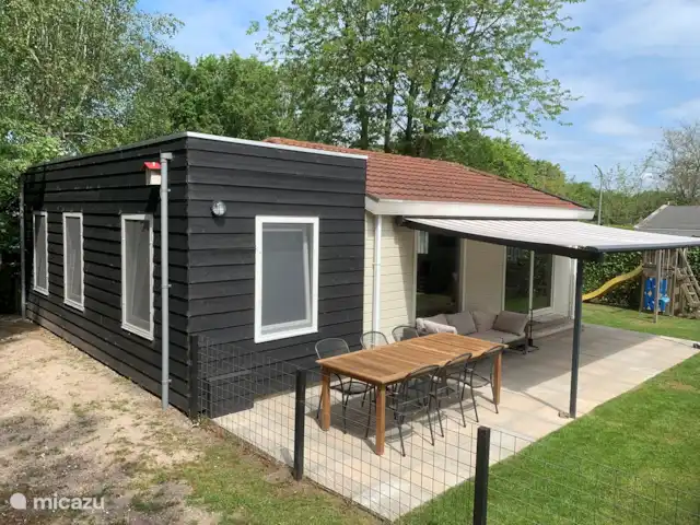 Bonita casa de vacaciones en la playa en Países Bajos, Holanda Meridional, Ouddorp - casa vacacional La casa