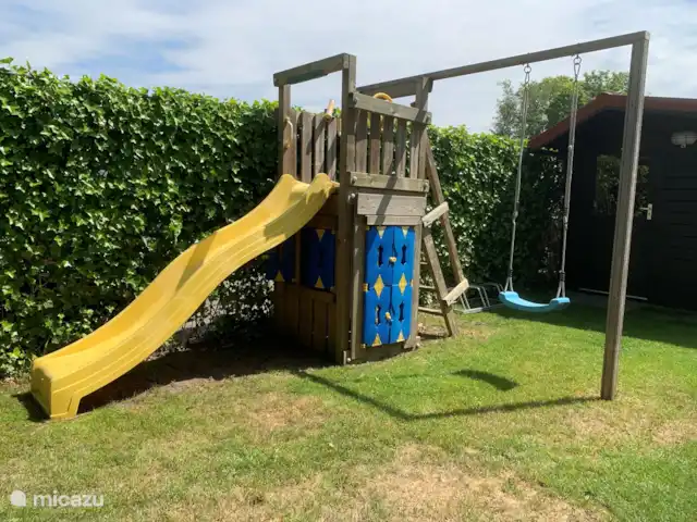 Bonita casa de vacaciones en la playa en Países Bajos, Holanda Meridional, Ouddorp - casa vacacional juego