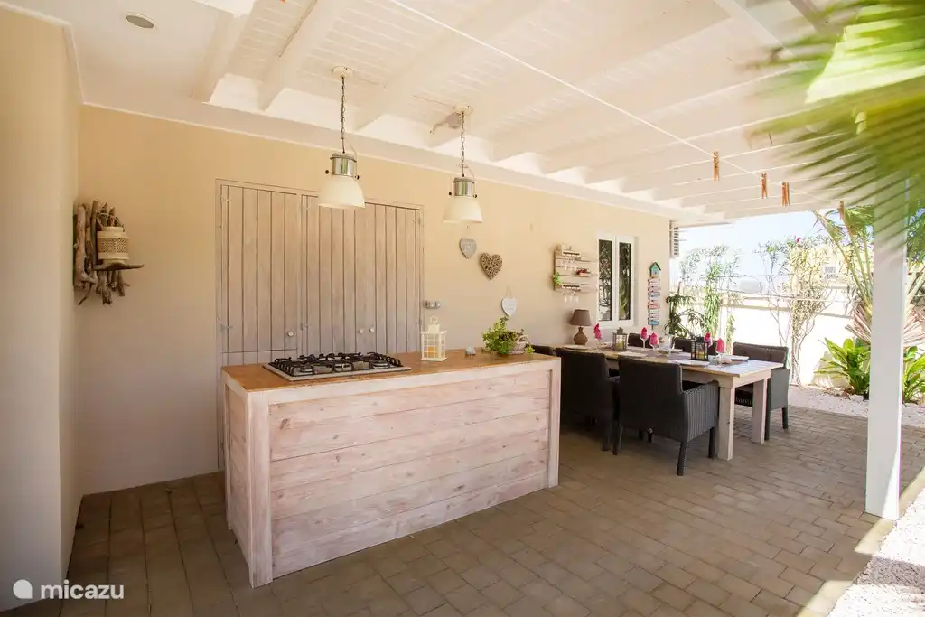 porche con cocina exterior