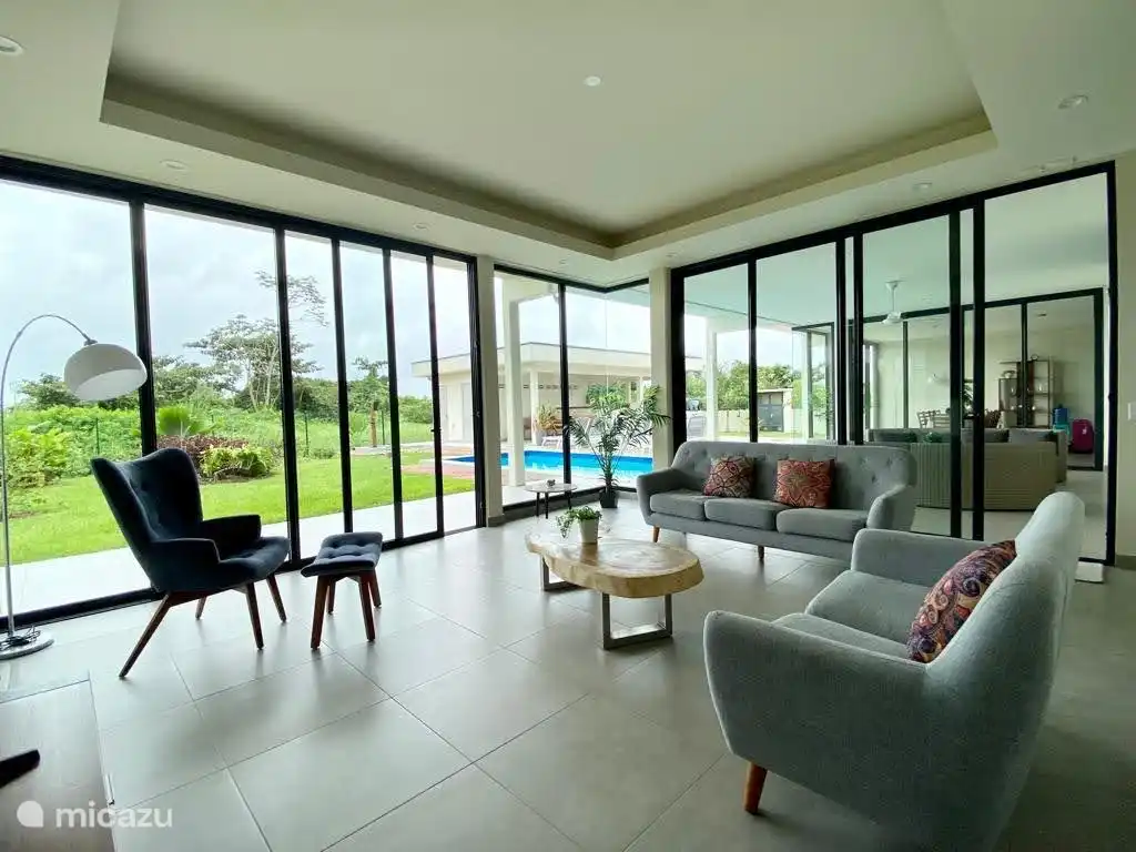 Living room with sliding doors. Inside becomes outside.