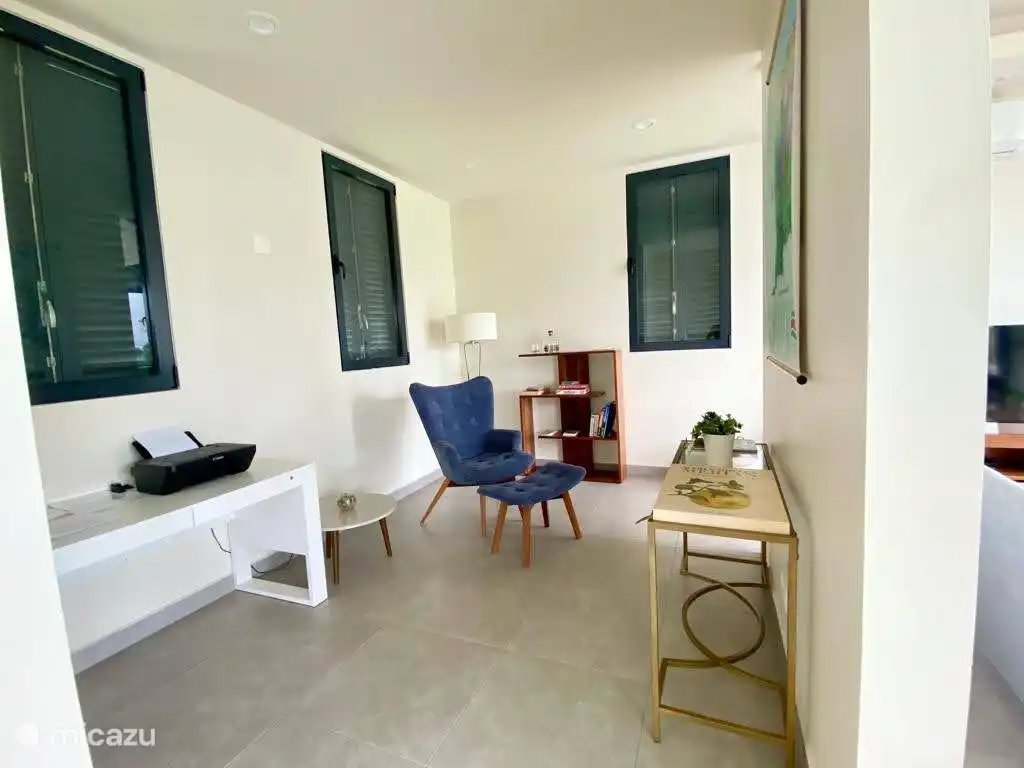 'Library', next to living room