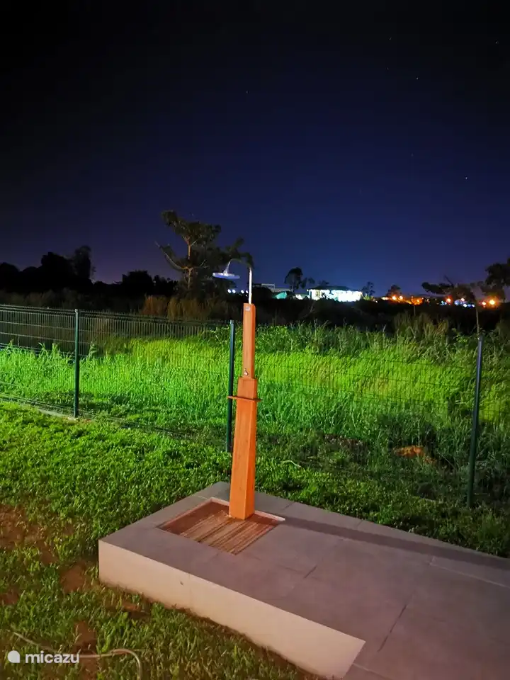 Outdoor shower next to the pool