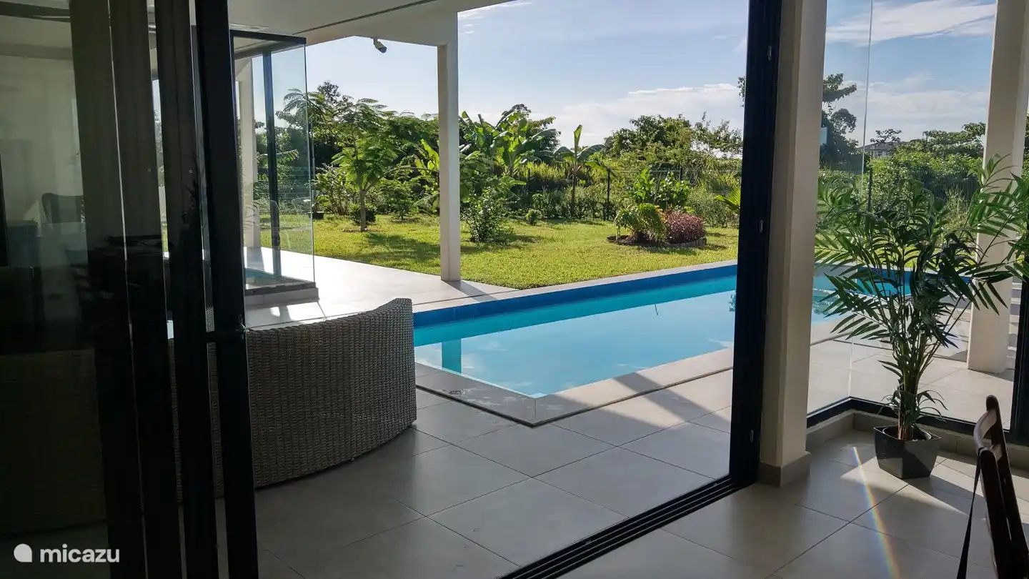 Inside leads to the pool and garden