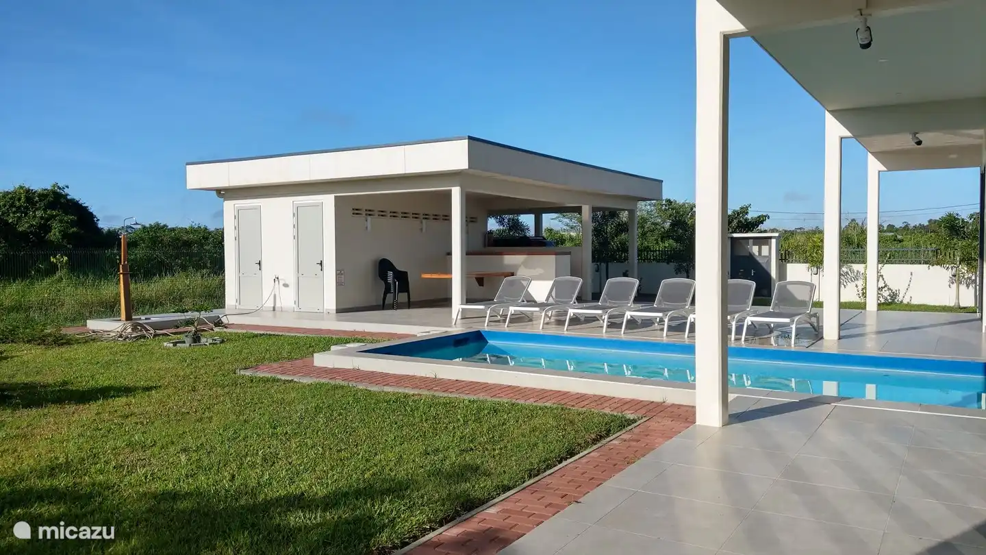 swimming pool and sun loungers