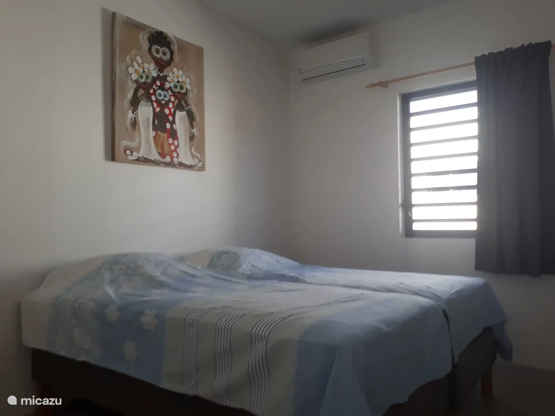 Slaapkamer 3 met twee losse 1 persoons bedden 