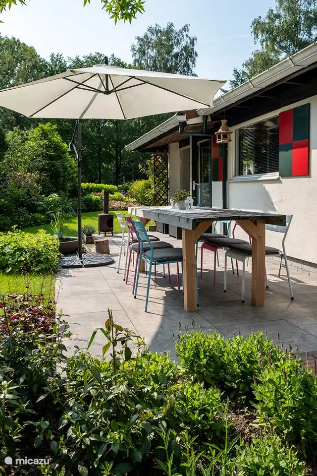 The cottage has a lovely terrace, where you can enjoy the sun until the late hours. Is it getting a little cooler? Make it even more cozy with the wood-burning stove.