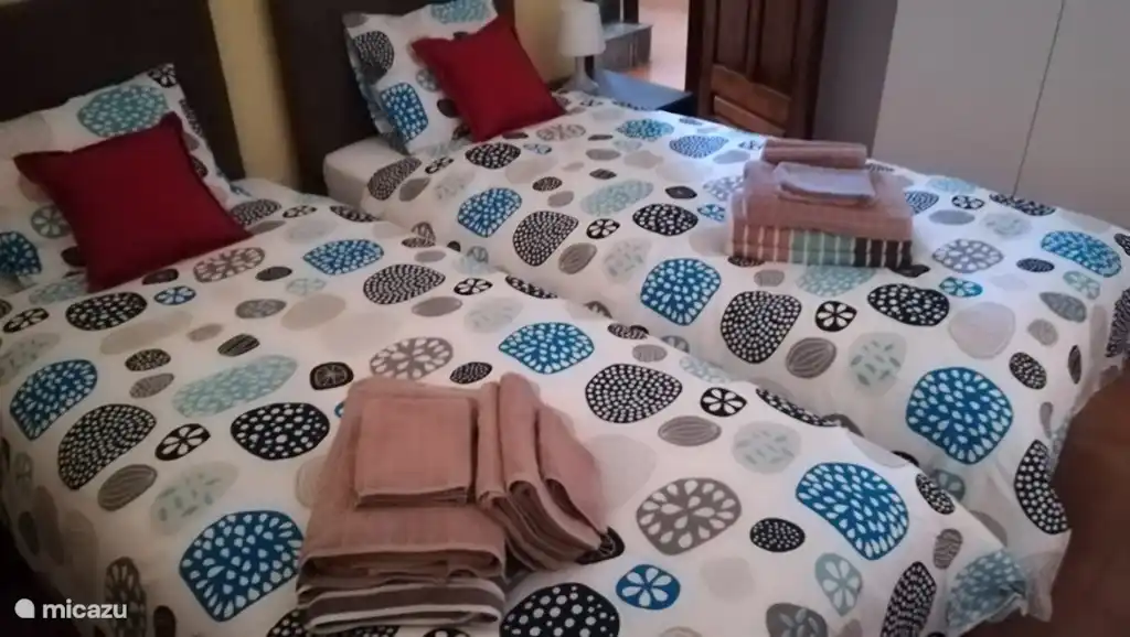 Room with two single beds. Can be transformed into a double bed (with topper)