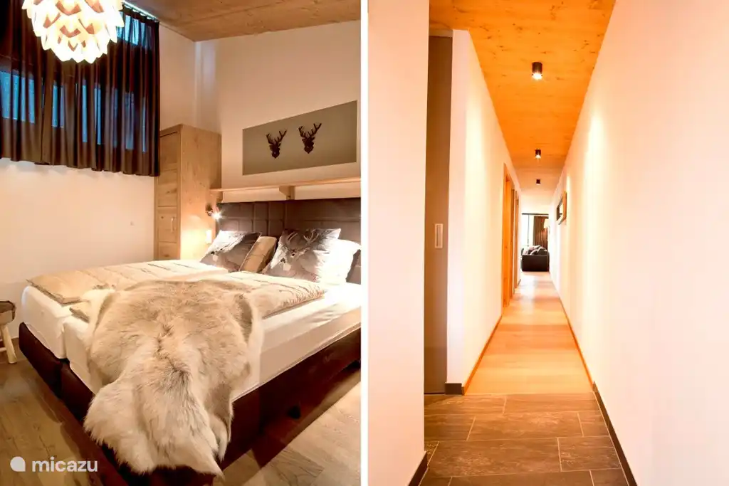 3. Schlafzimmer mit Luxus-Boxspring-Bett mit Memory-Foam-Matratze und dem schönen langen Korridor.