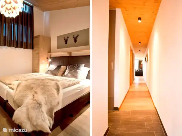 Résidence Neukirchen | Autriche, Salzburgerland, Neukirchen am Grossvenediger - appartement 3ème chambre avec lit sommier luxueux avec matelas en mousse à mémoire de forme et le beau long couloir.