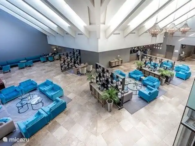 Location de Vacances Afrique du Sud, Le Cap (Cap occidental), Le Cap, appartement - Plage du lagon, Le Cap Le hall de l'hôtel attenant, accessible de l'intérieur. Où un restaurant, un bar et une piscine sont également pour les clients de l'appartement.