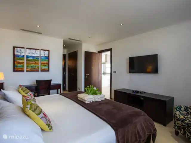 Le brin | 5 pers. appartement | Curaçao, Curaçao-Centre, Willemstad - appartement Chambre des maîtres avec salle de bain privée.